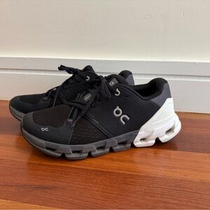 On Running Black and White Athletic Shoes